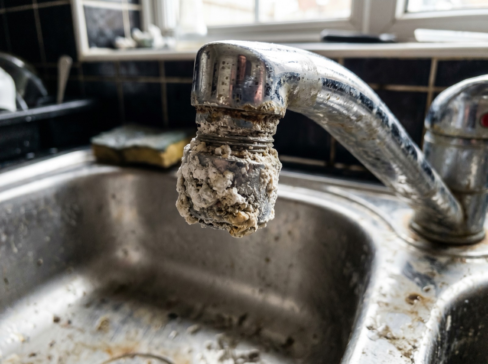 Scale buildup on a faucet